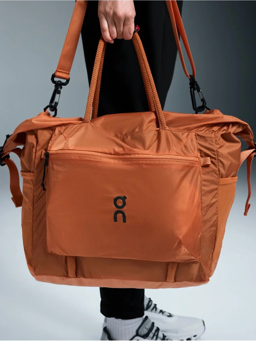 On Running Orange Track Pack 35L Lite
